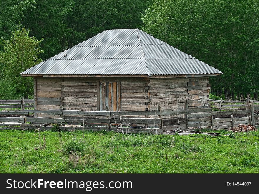 Old house in green wood. Old house in green wood