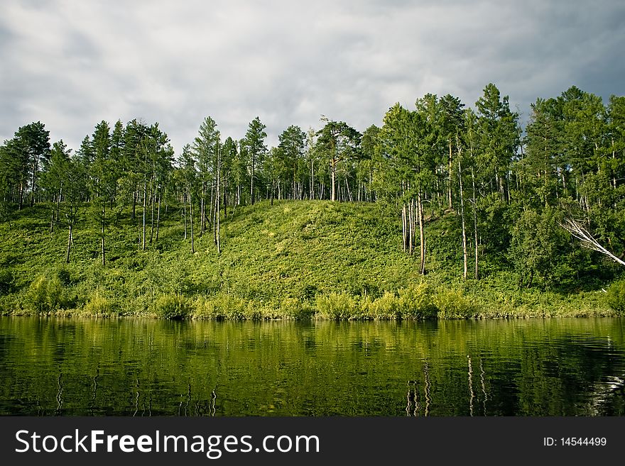 Green bank of Dep river, the Amur region, Russia