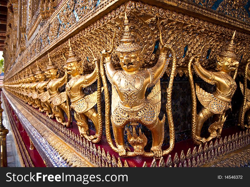 Garuda around the temple's base in Thailand Grand palace. Garuda around the temple's base in Thailand Grand palace