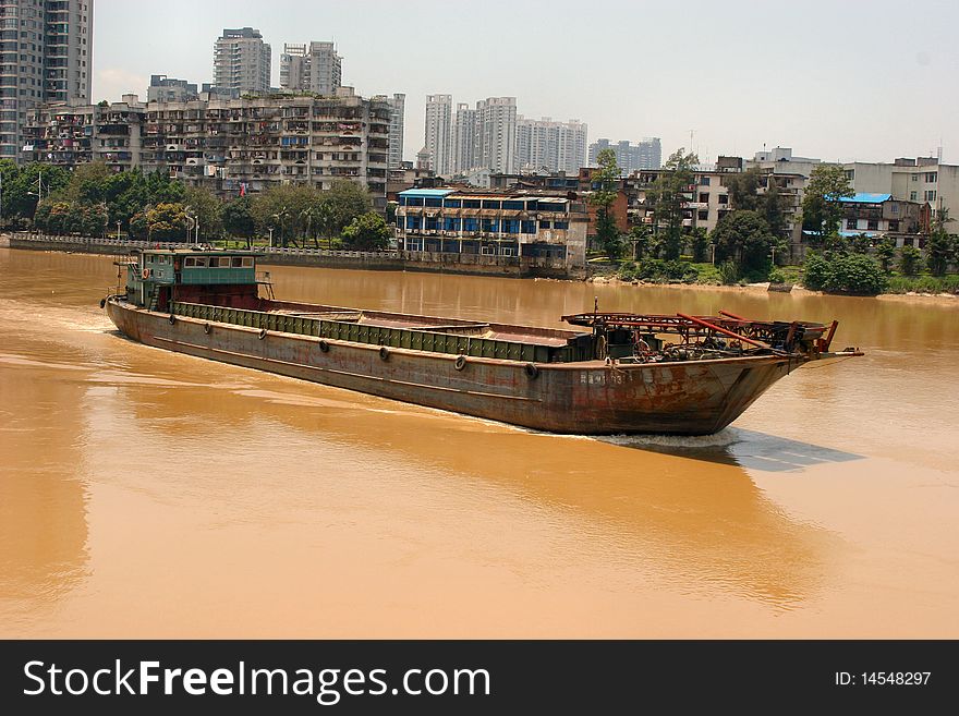 Chinese shipping boat going through Yang river. Chinese shipping boat going through Yang river