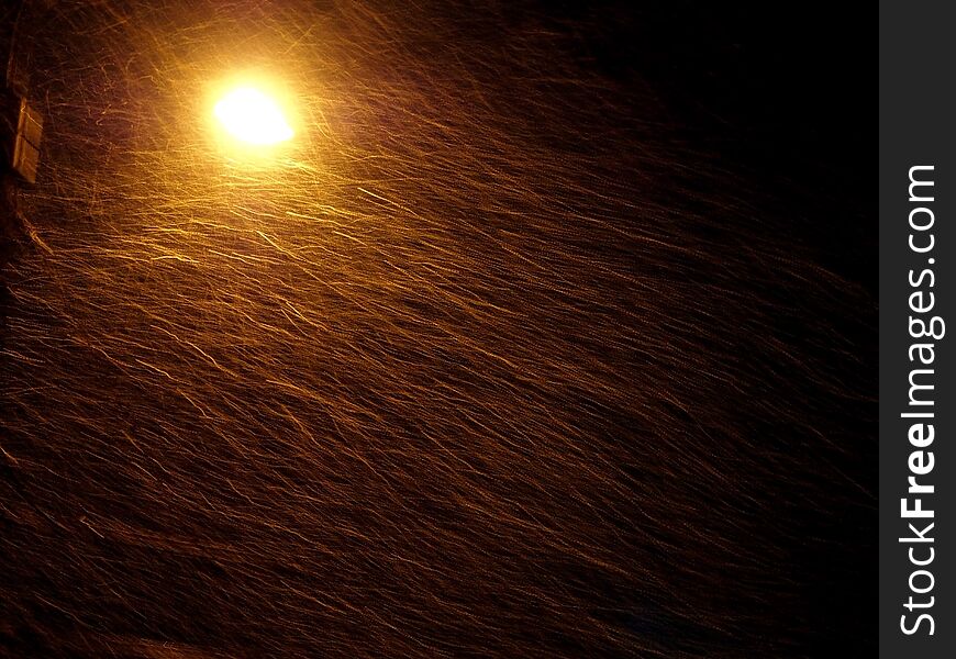 Night Snow In The Light Of A Street Lamp, Long Exposure