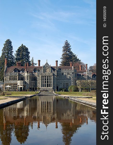 Traditional English country manor with ornamental pond. Victorian /Edwardian architecture. Traditional English country manor with ornamental pond. Victorian /Edwardian architecture.
