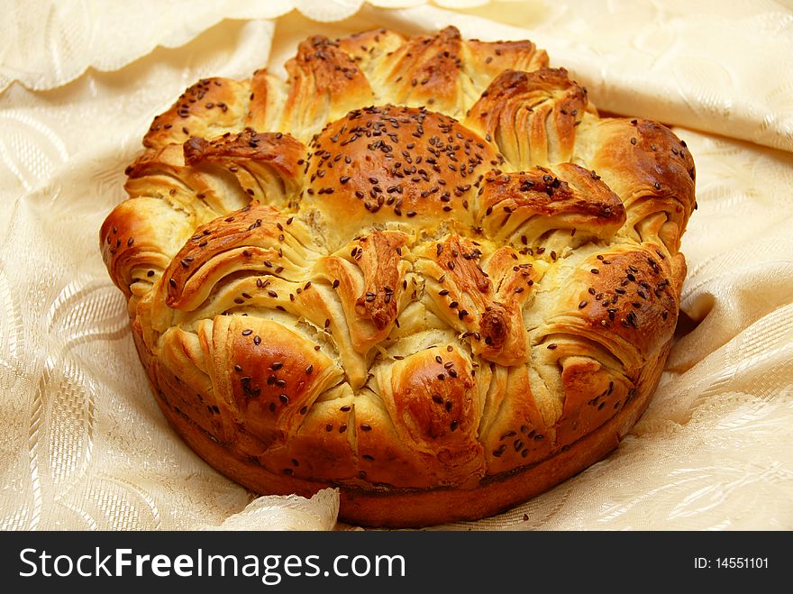 Appetizing fresh homemade decorative bread with flax seeds