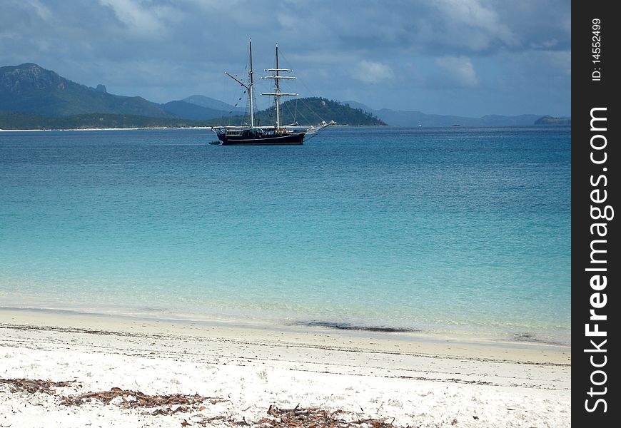 Schooner anchored in a beautiful bay in Australia inside the Great Barrier Reef. Schooner anchored in a beautiful bay in Australia inside the Great Barrier Reef.