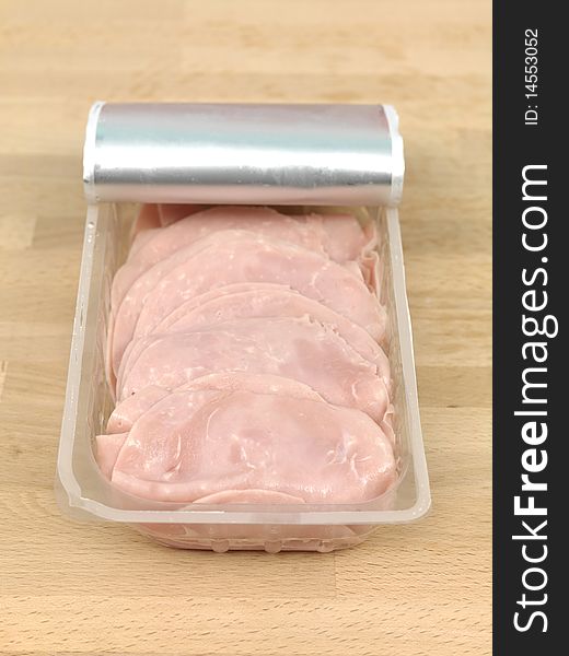 Sliced sandwich ham on a kitchen bench