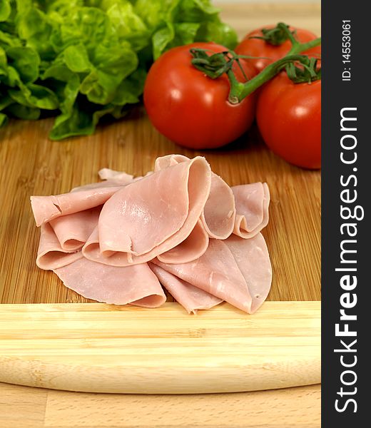 Sliced sandwich ham on a kitchen bench