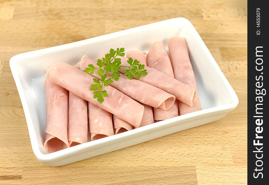 Sliced sandwich ham on a kitchen bench