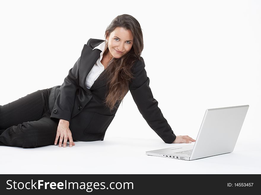Attractive young businesswoman working with laptop computer smiling. Attractive young businesswoman working with laptop computer smiling