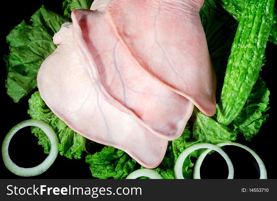 Three pig's ear, and lettuce and balsam pear, and Onions. Three pig's ear, and lettuce and balsam pear, and Onions.