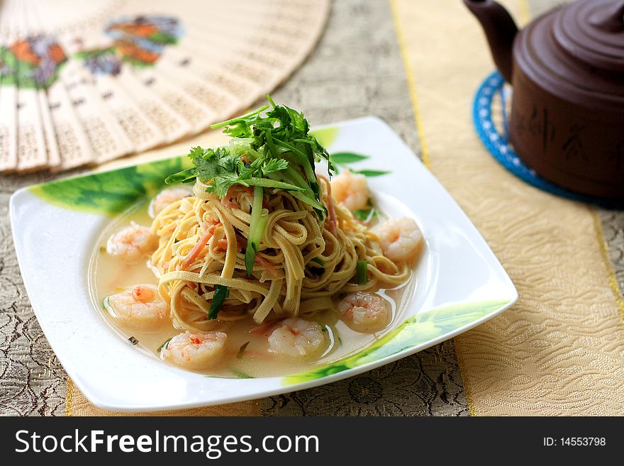 A plate of tofu wire and shrimp.Focus across the middle of image. A plate of tofu wire and shrimp.Focus across the middle of image.
