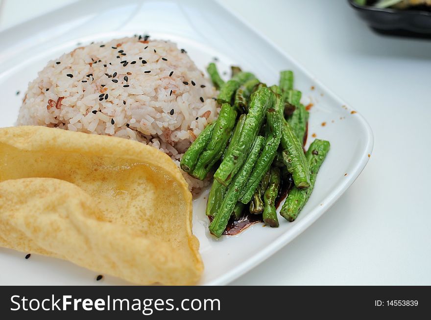 Healthy unpolished red rice and beans