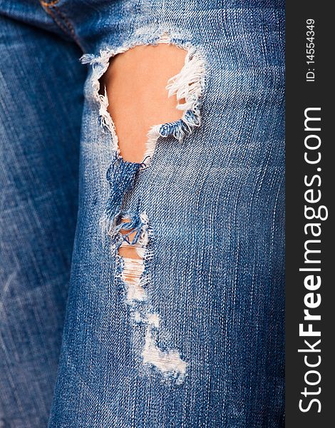 Blue jeans full of holes