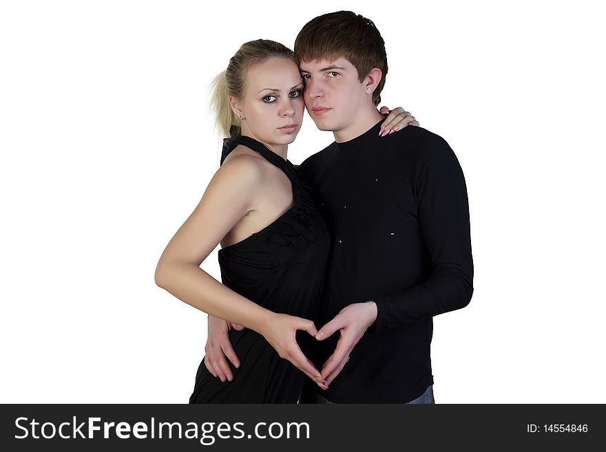 Boy and girl posing on a white background. Boy and girl posing on a white background