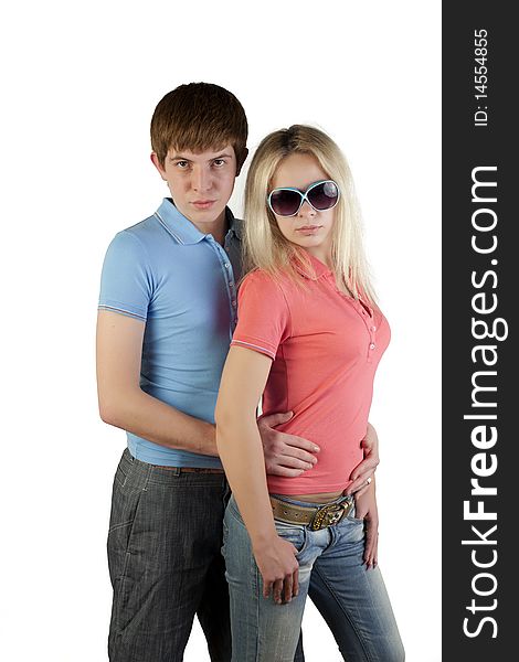 Girl and boy posing on a white background. Girl and boy posing on a white background