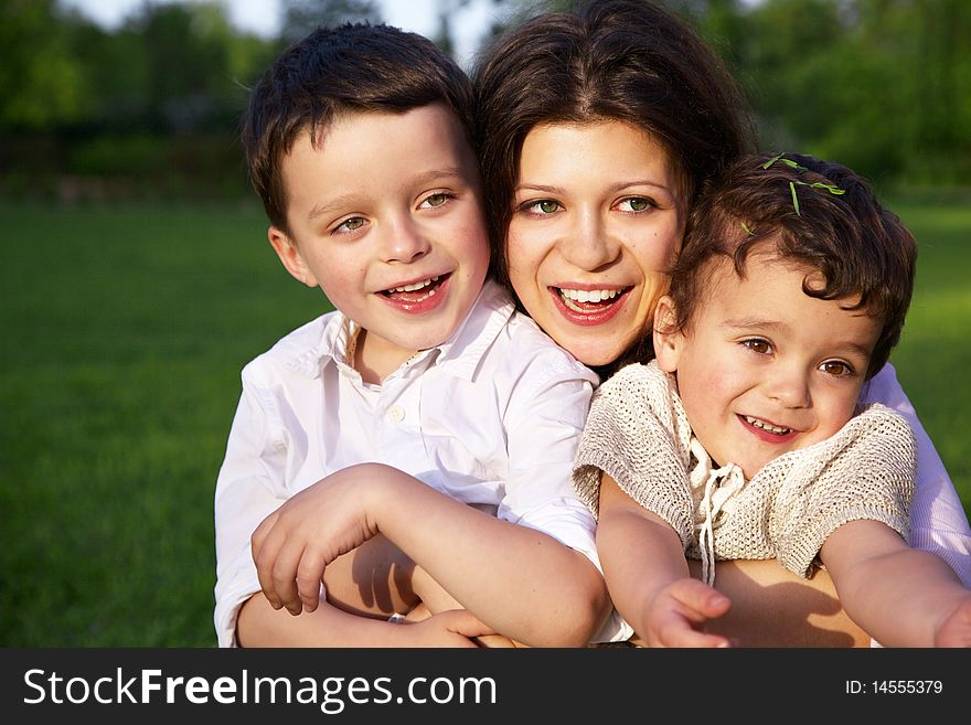 Mother with her two sons outdoor. Mother with her two sons outdoor