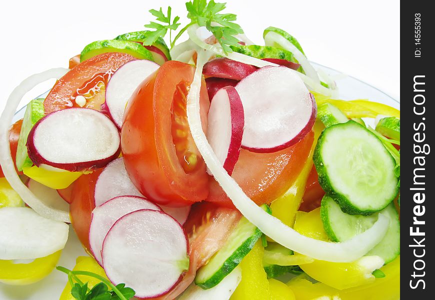 Vegetable salad with tomato cucumber radish and yellow pepper. Vegetable salad with tomato cucumber radish and yellow pepper