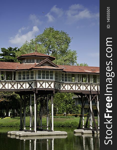 Walkway in the palace across the pond