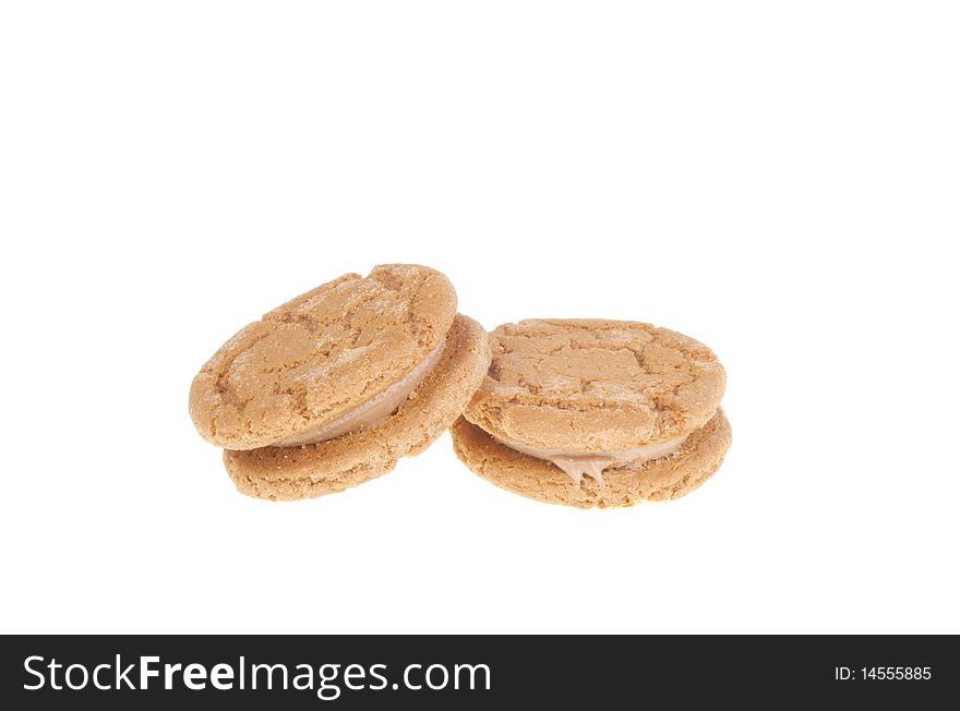 Two chocolate cream biscuits isolated on white. Two chocolate cream biscuits isolated on white