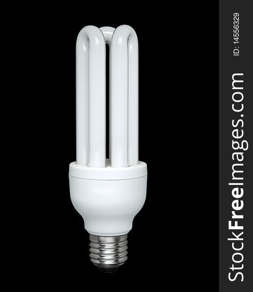 Compact fluorescent light bulb over a black background. Compact fluorescent light bulb over a black background.