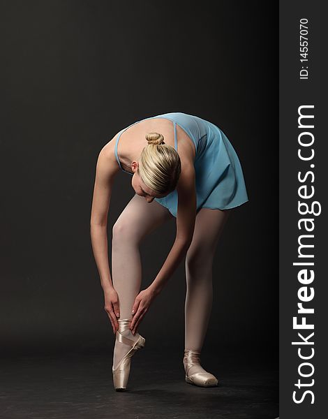 Beautifull young blond ballerina. Studio shot