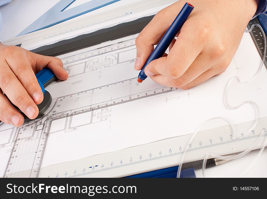 Architect Working On Architectural Plans