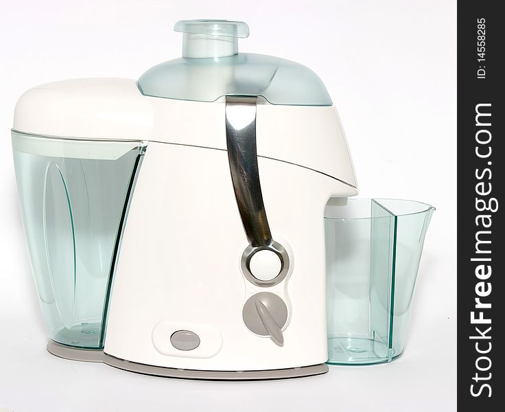 Modern juice extractor on a white background