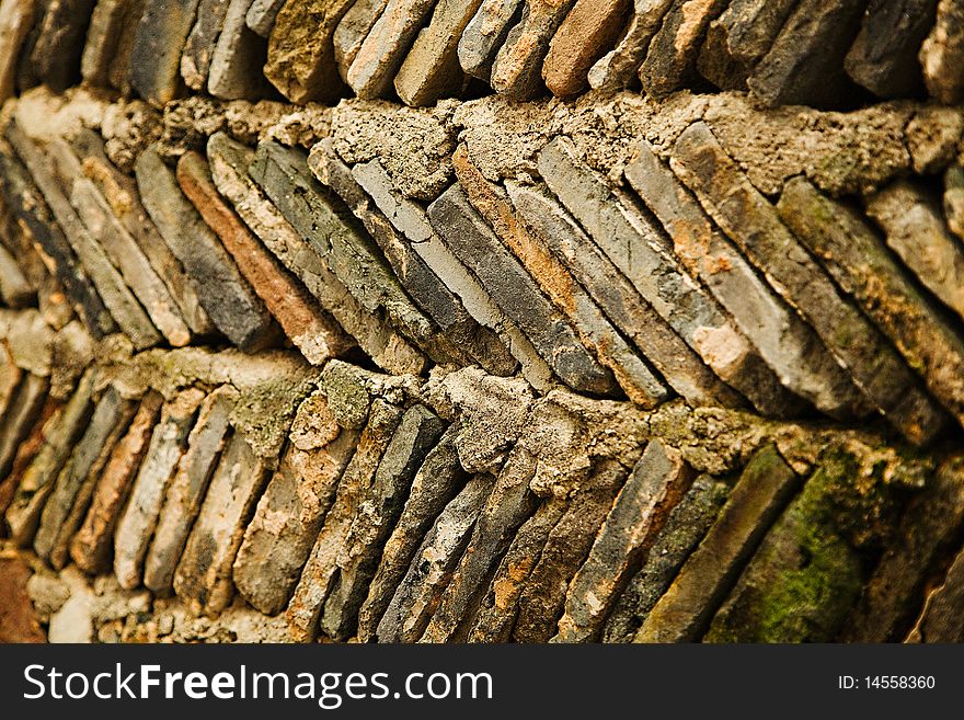 Diagonally stacked bricks make up a wall dating back to 1600. Diagonally stacked bricks make up a wall dating back to 1600.