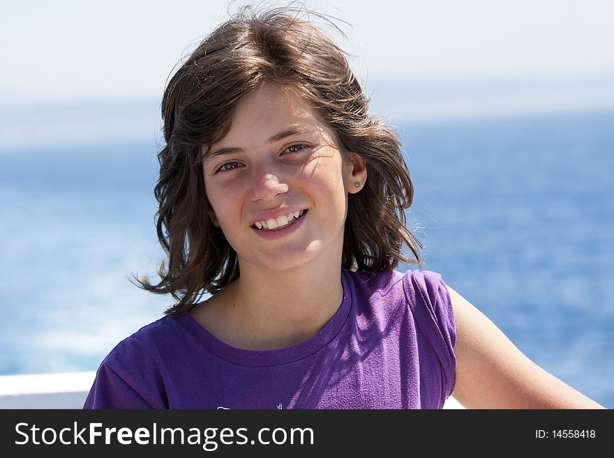 Girl smiling with hair blowing