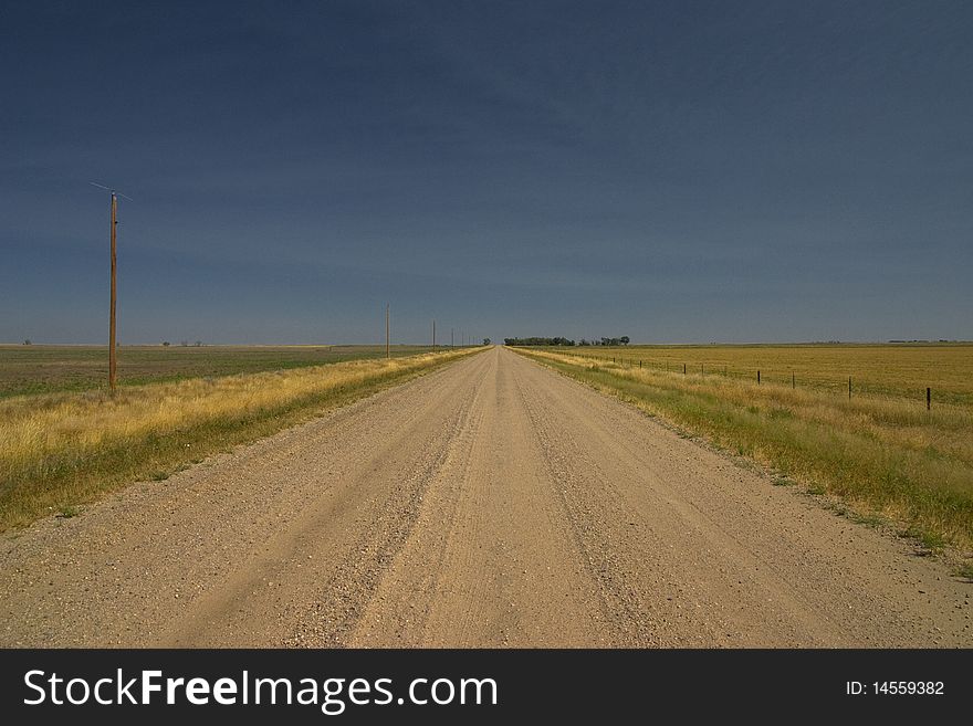Straight dirt road in the state of South Dakota