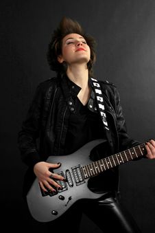 Rock Girl In Leather Outfit With Electric Guitar Royalty Free Stock Image Rock Girl In Leather Outfit With Electric Guitar Royalty Free Stock Image