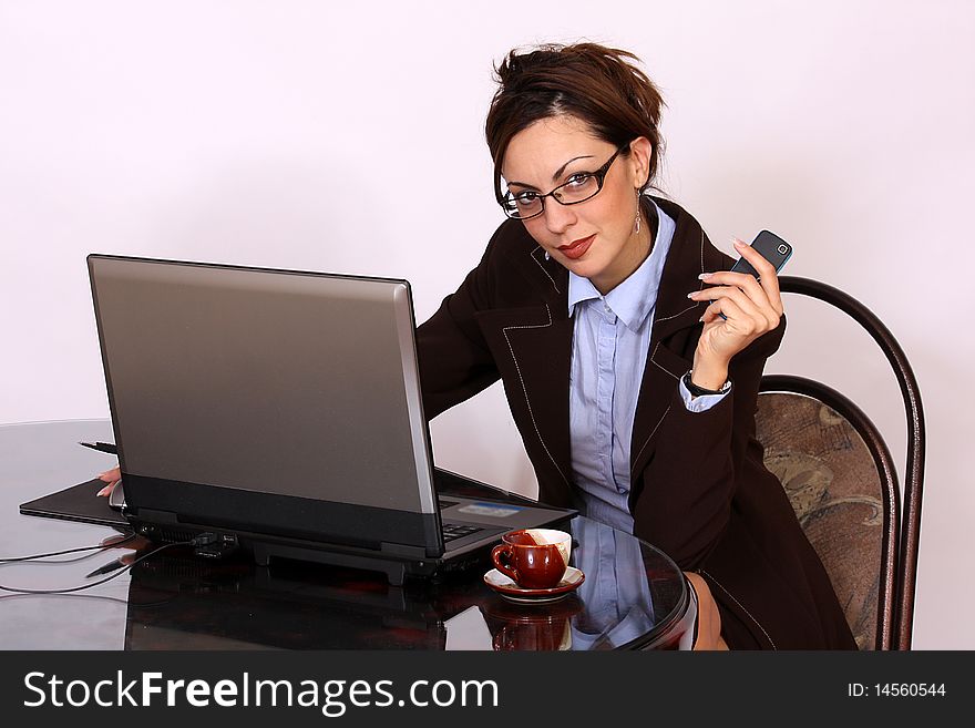 Businesswoman working on lap top computer