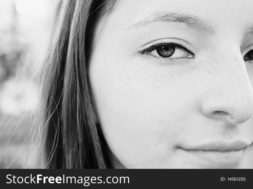 Portrait of beautiful young girl, half face in the frame. Portrait of beautiful young girl, half face in the frame