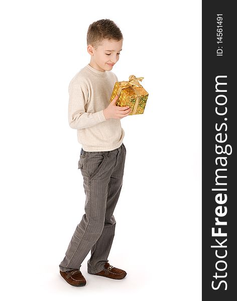 Child with a gift box isolated over white