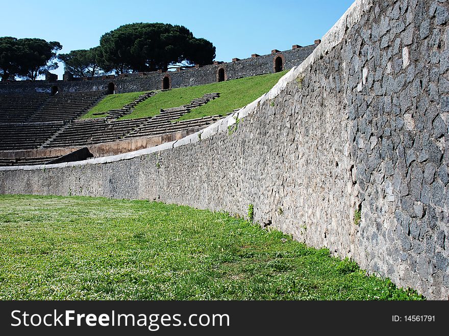 The ancient amphiteatre of Pompei in a sunny day. The ancient amphiteatre of Pompei in a sunny day