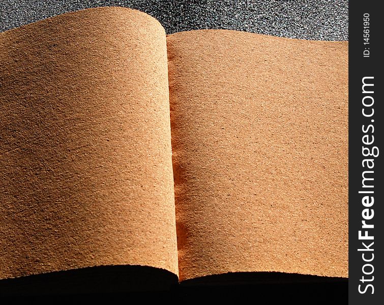 A writable book made of cork. A writable book made of cork