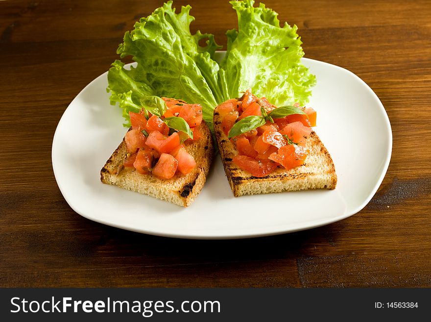 Photo of italian appetizer called bruschetta