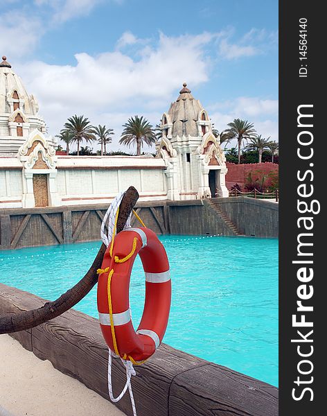 Life buoy on the background of swimming pool in the water park