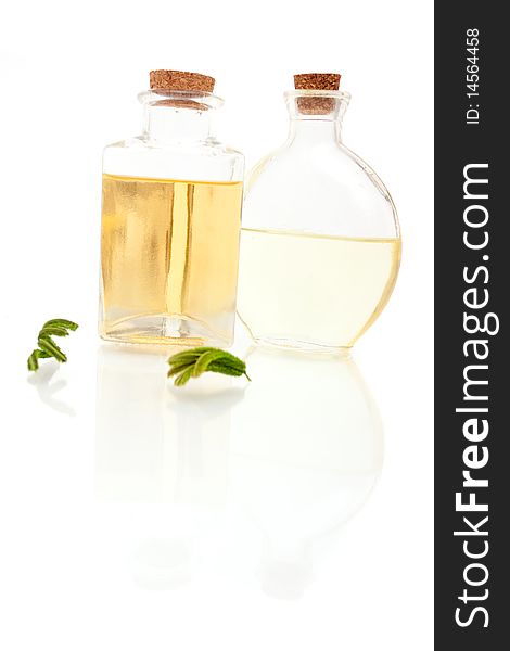 Aromatherapy oils on white background