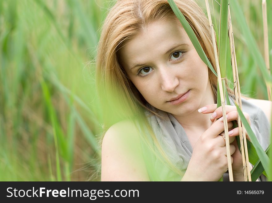 Beautiful teen blond girl at the meadow. Beautiful teen blond girl at the meadow