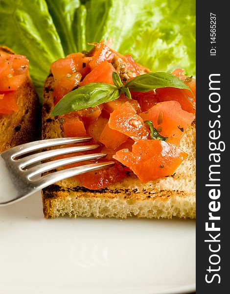 Photo of italian appetizer called bruschetta