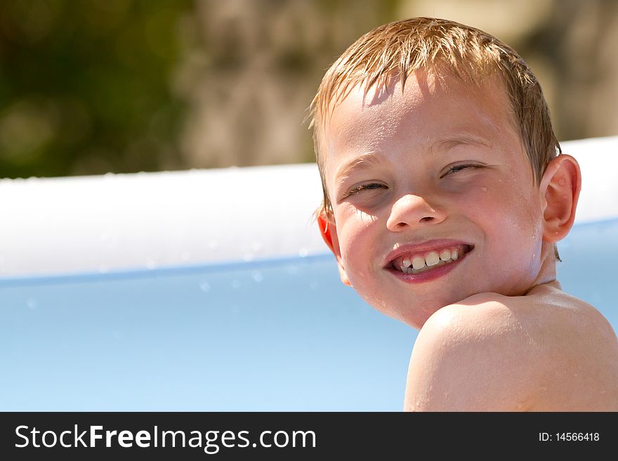 Portrait of a young child in a swimming pool