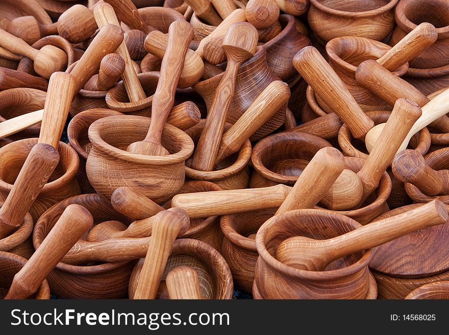 Wooden mortars and pestles as background