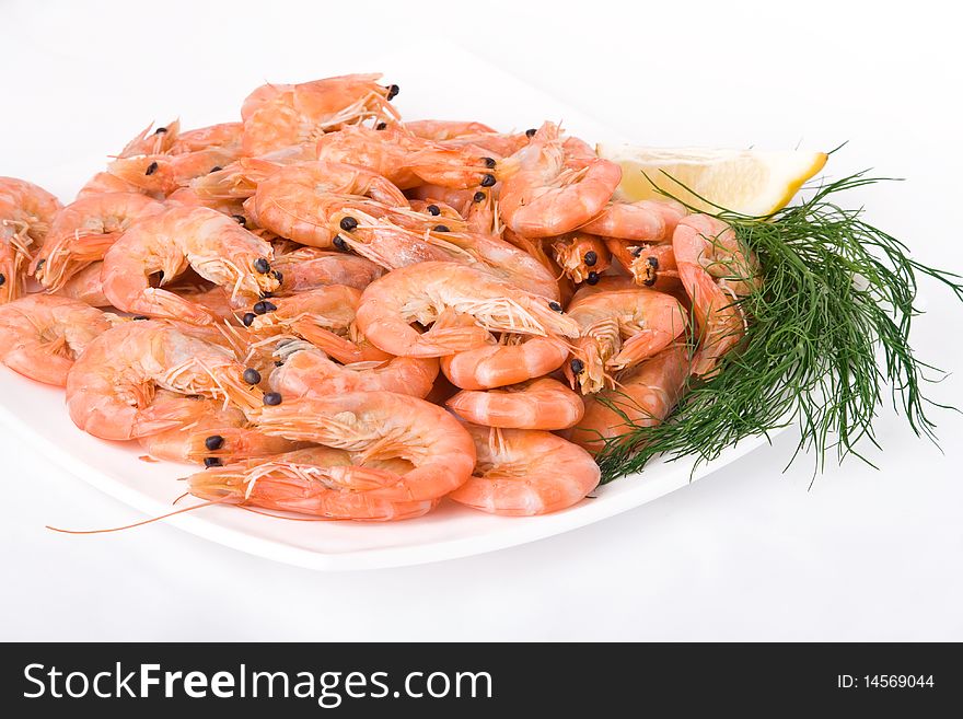 Close-up of boiled shrimps on a plate