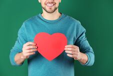 Free Man With Decorative Heart On Color Background Royalty Free Stock Photography - 145677807