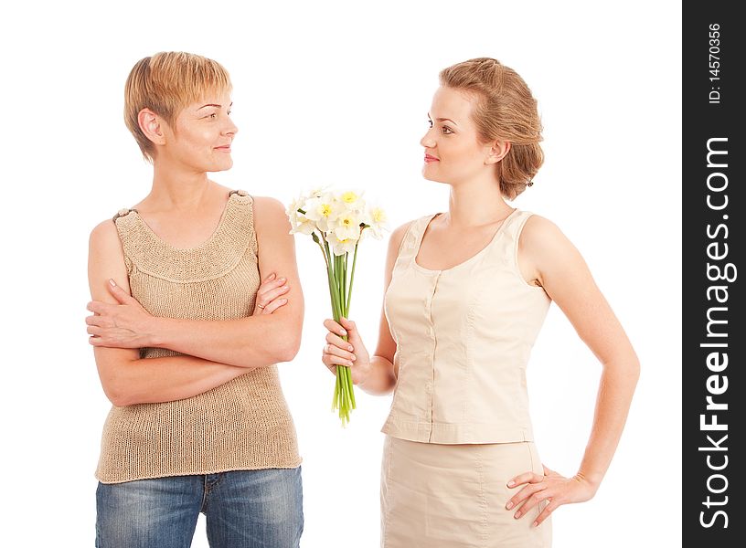 Mother and daughter with flowers isolated on white