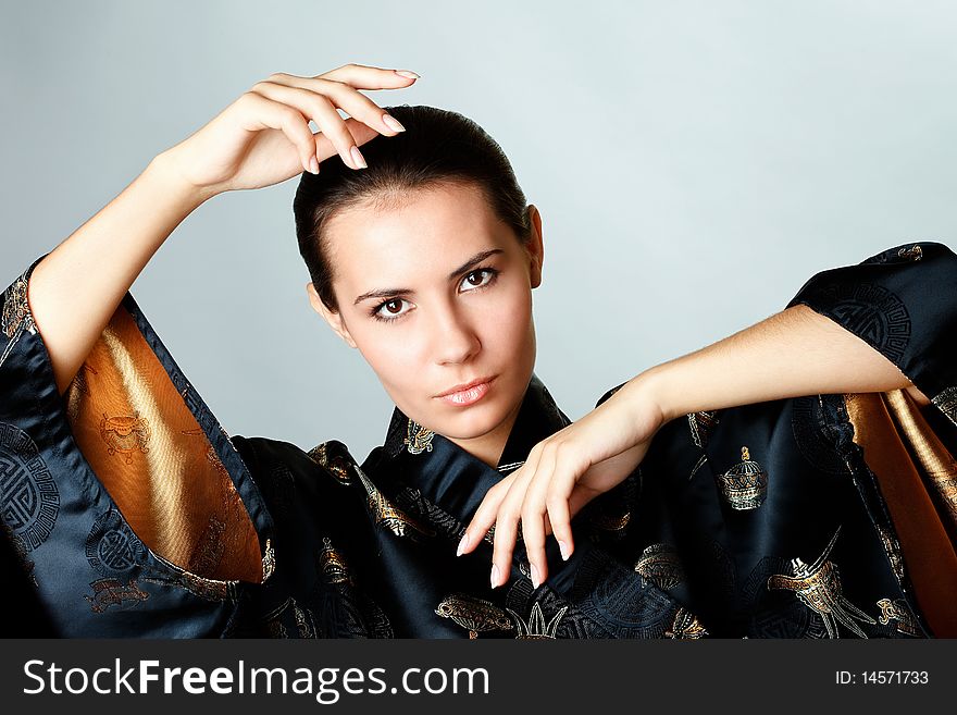 Young attractive girl poses during a photo session