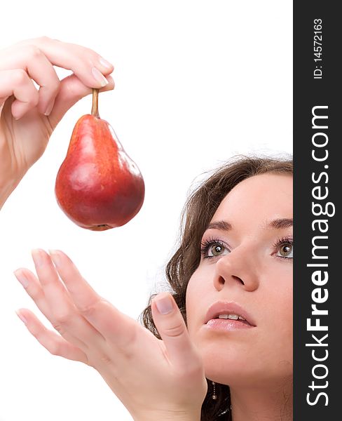 Beauty brunet woman`s fase and pear in hand. Beauty brunet woman`s fase and pear in hand.