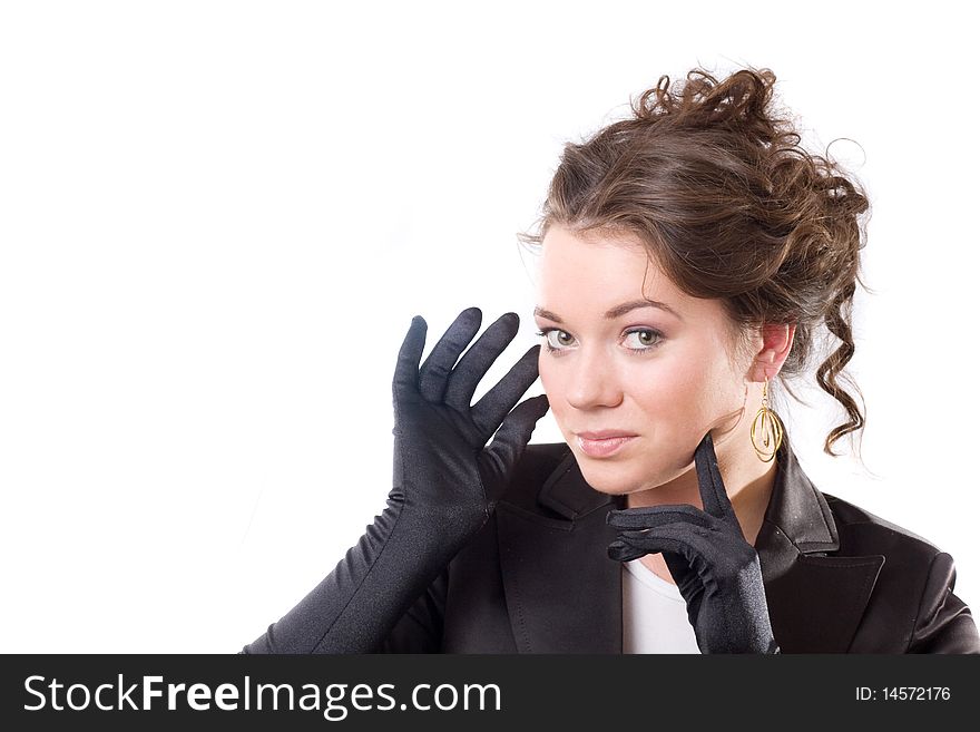 Brunet woman in black gloves. Make-up, hairstyle. Isolated.