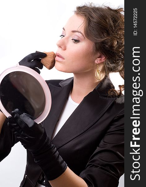 Brunet woman in black gloves. Make-up, hairstyle. Isolated.