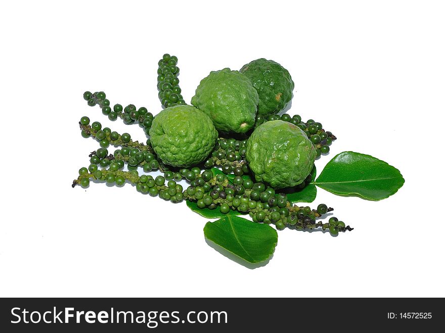 Pepper and kaffir lime isolated on white background.